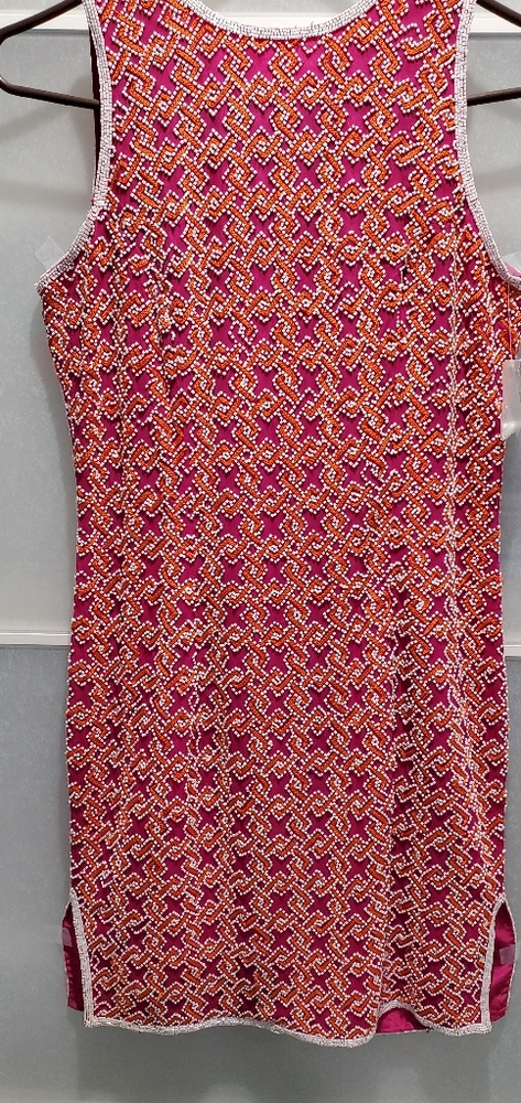 Fun silk dress with geometrical beading.